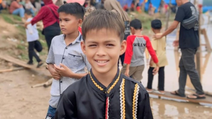 **Dhika, Penari Pacu Jalur Kuantan Singingi, Riau: Tradisi Eksotis yang Wajib Dikunjungi!**