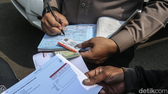 **Bayar Tilang di Tempat dengan Bukti Struk: Transparansi dan Keamanan Transaksi**