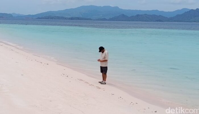 Keluarga Tulis Nama Pelatih Valencia dan Anak di Pantai Pink, Menyusuri Pesona Travel Unik