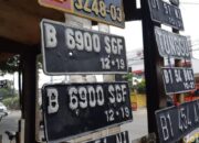 Tukang Tambal Ban Pungut Pelat Nomor Terbawa Banjir, Minta Tebusan Rp 50 Ribu: Fenomena Unik atau Kebijakan yang Tidak Tepat?